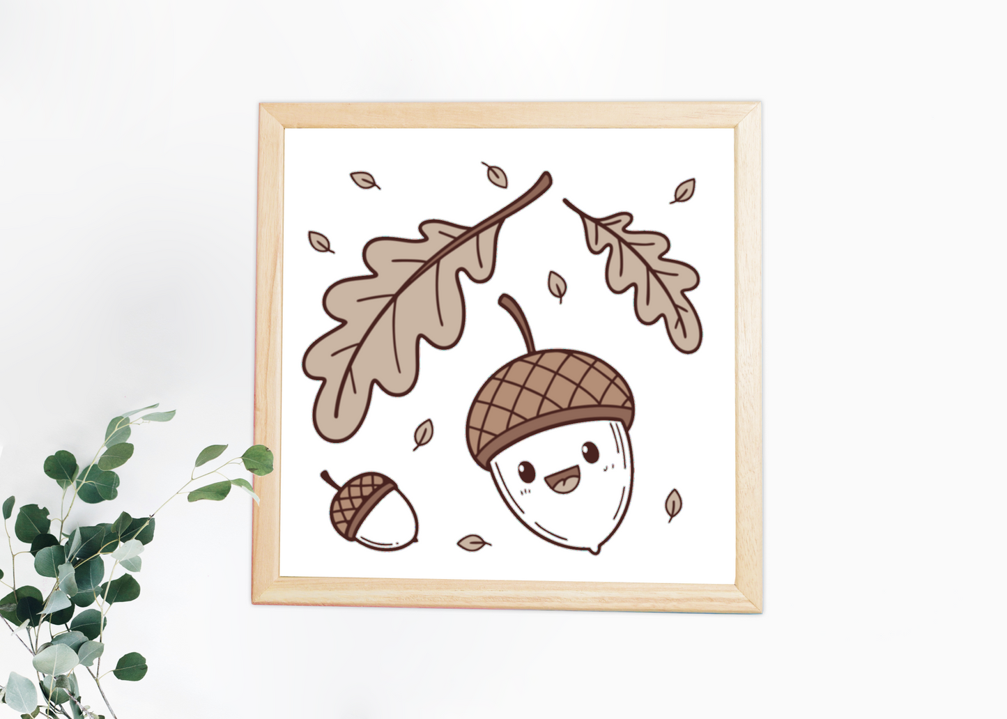 Cadre avec un motif floral joyeux illustrant un gland automnal