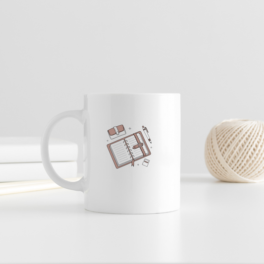 Mug avec icône minimaliste stylisé carnet ouvert ambiance papeterie élégante