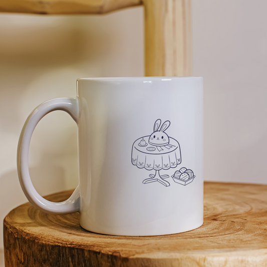 Mug avec un design minimaliste printanier représentant un lapin gourmand à table