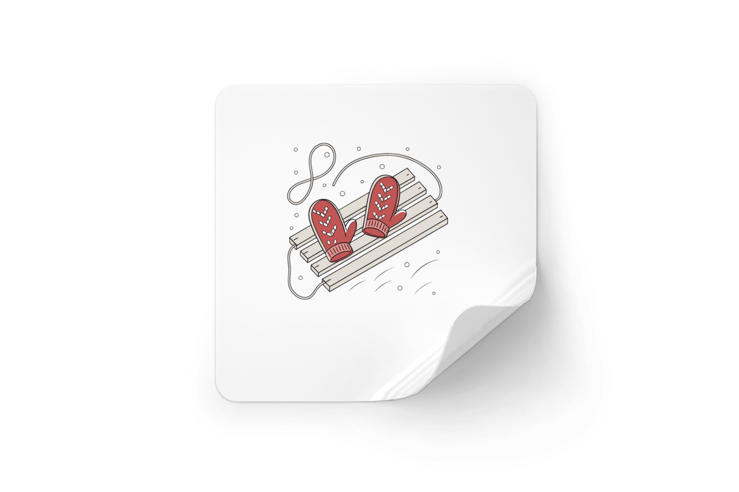 Sticker hivernal avec motif de moufles glissant sur une luge stylisée élégamment