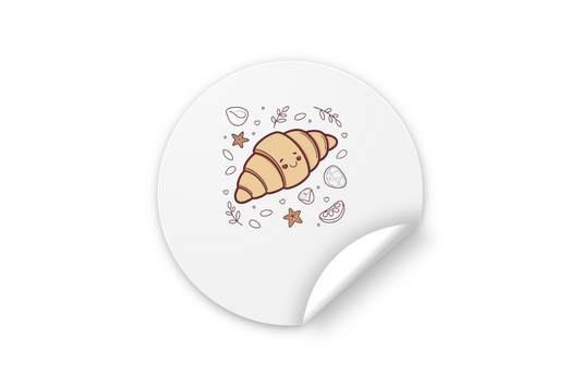 Sticker amusant avec croissant souriant pour un petit-déjeuner joyeux