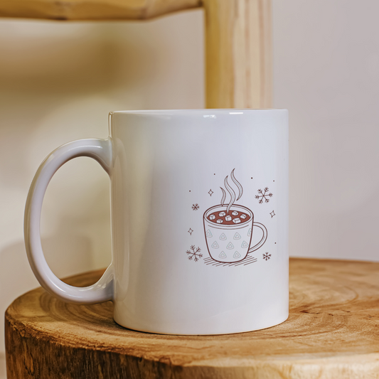 Mug avec design cozy hivernal évoquant un chocolat chaud fumant