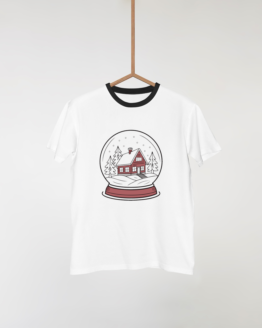 T-shirt avec maison enneigée boule à neige pour look hivernal chaleureux