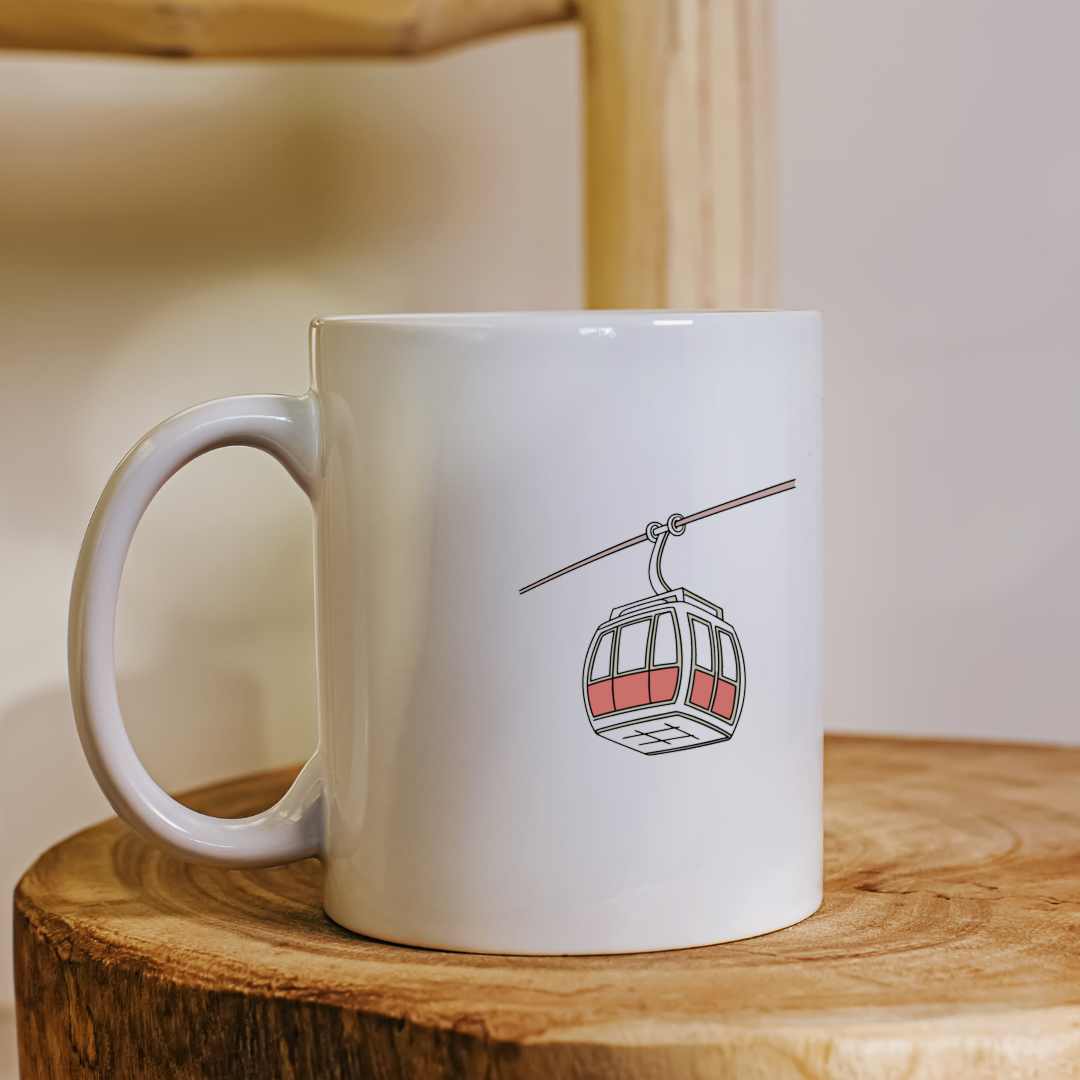 Mug décoré d'une télécabine en mouvement stylisée pour une touche montagnarde