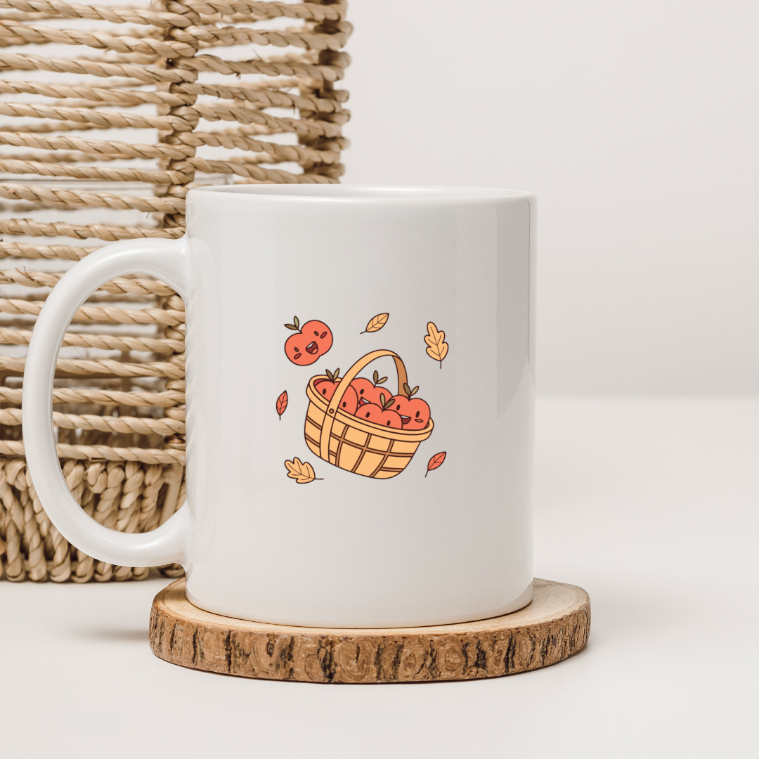 Mug illustré de pommes souriantes style kawaii, en vibrant thème automnal