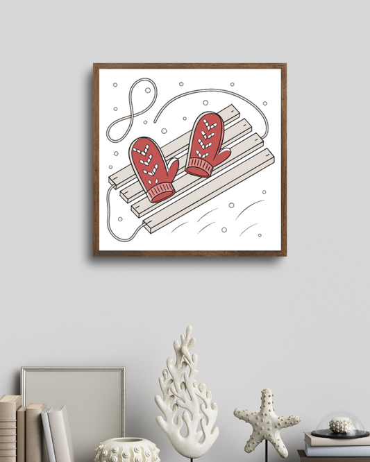 Cadre décoratif avec motif hivernal stylisé de moufles sur luge