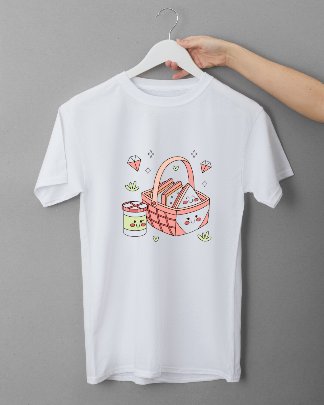 T-shirt estival avec panier de pique-nique joyeux en motifs pastel stylisés
