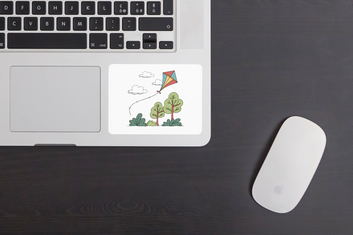 Sticker coloré montrant un cerf-volant flottant dans le ciel idéal pour journées extérieures