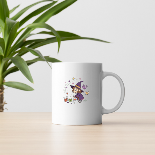 Mug décoré d'un jeune sorcier féérique concoctant des potions magiques