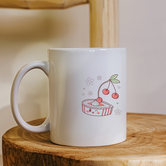 Mug affichant une cerise joyeuse style kawaii sur fond blanc lumineux