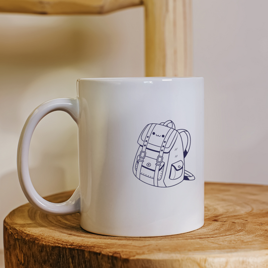 Mug blanc avec doodle coloré d’un sac à dos kawaii ambiance éducative