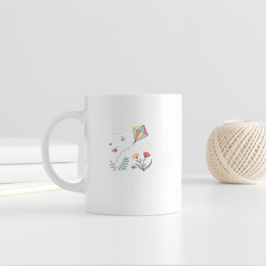 Mug avec cerf-volant pastel dansant sur fond printanier coloré