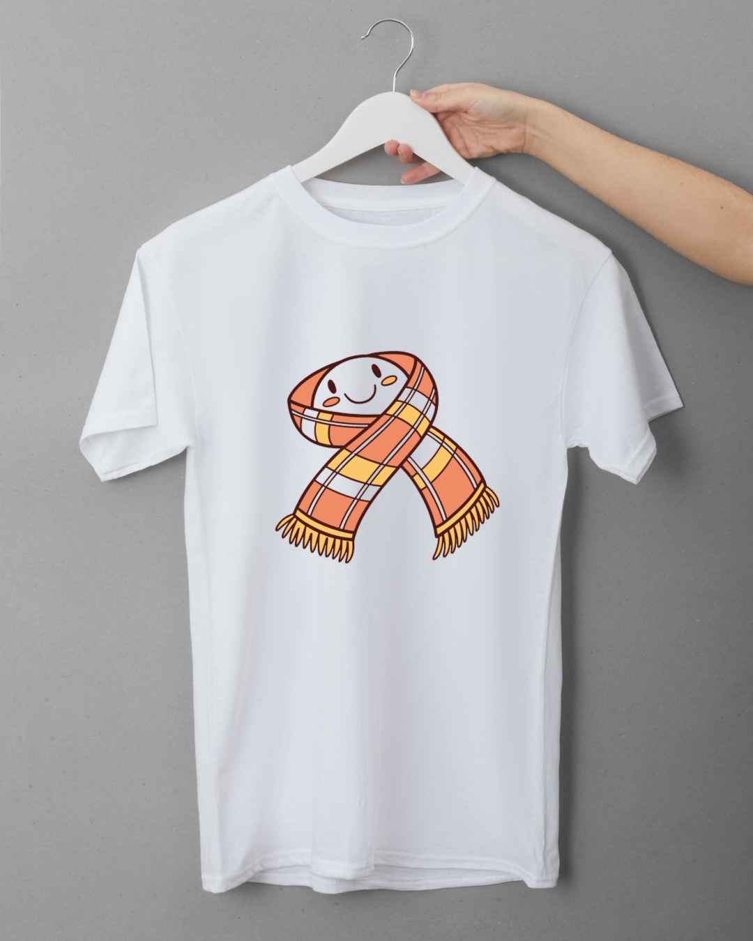 T-shirt décoré d'une écharpe kawaii souriante sur le thème hivernal