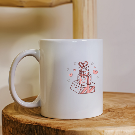 Visuel kawaii sur mug : cadeau empilé adorable.