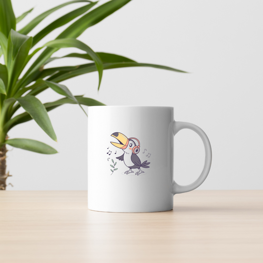 Mug décoré avec toucan exotique dans un style mélomane et stylisé
