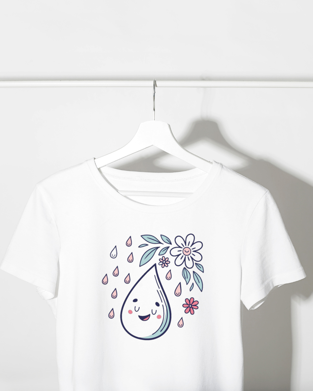 T-shirt moderne avec goutte souriante pastel sous une pluie printanière colorée