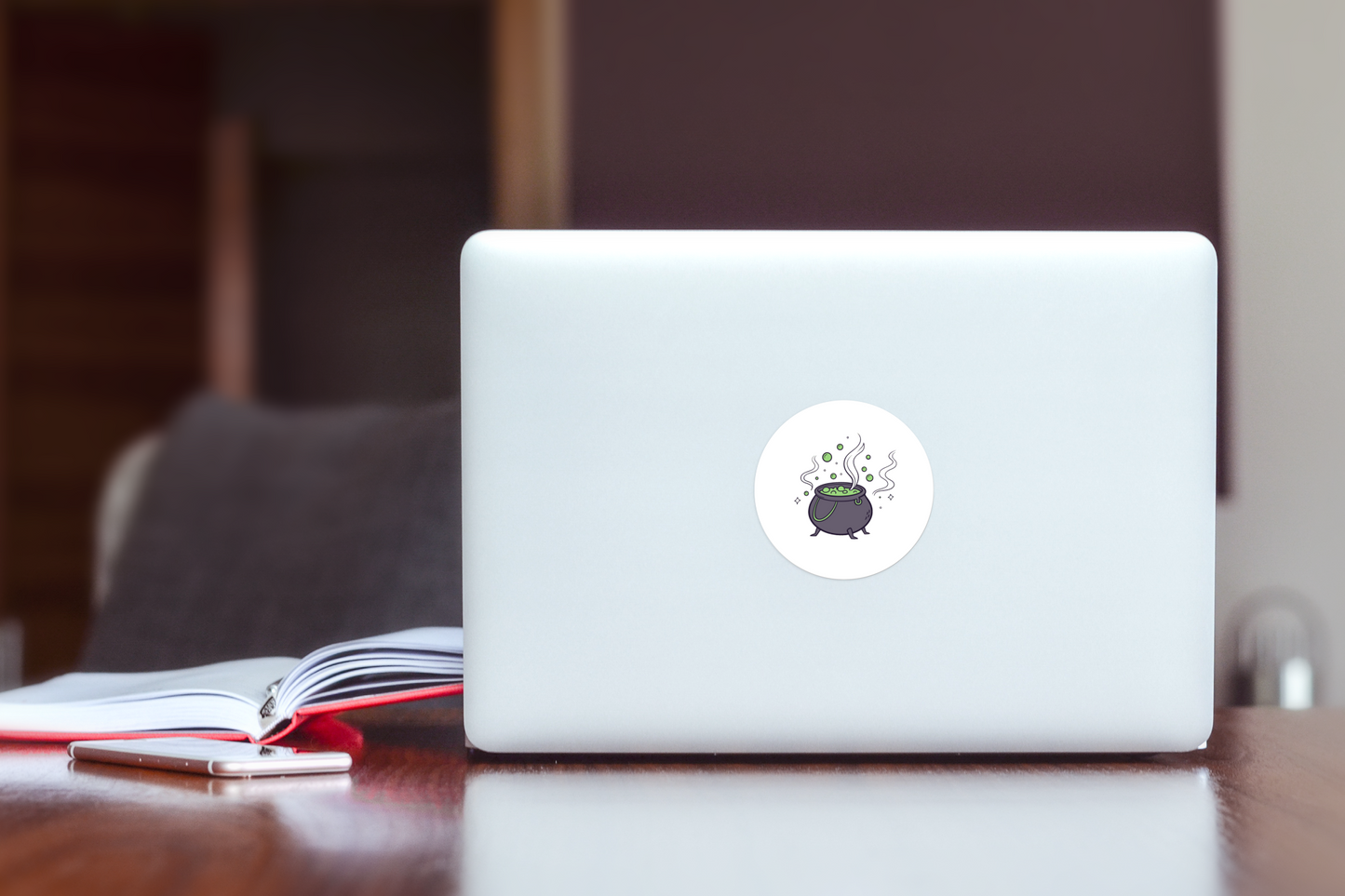 Sticker avec motif chaudron magique évoquant l'ambiance mystérieuse d'Halloween