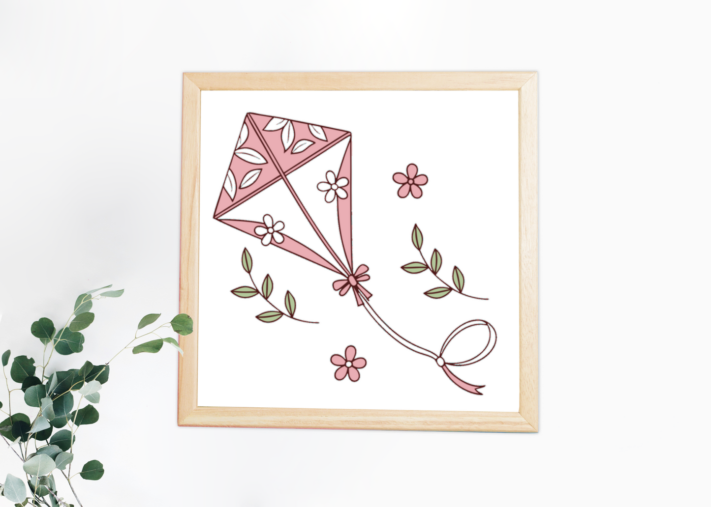 Cadre pastel avec cerf-volant fleuri, ambiance printanière et enchantée