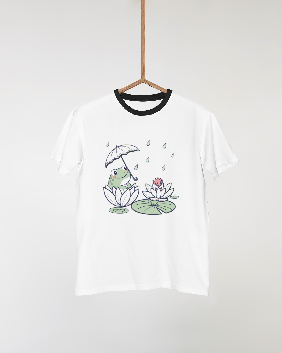 T-shirt orné d'une grenouille paisible sous la pluie dans des tons pastel