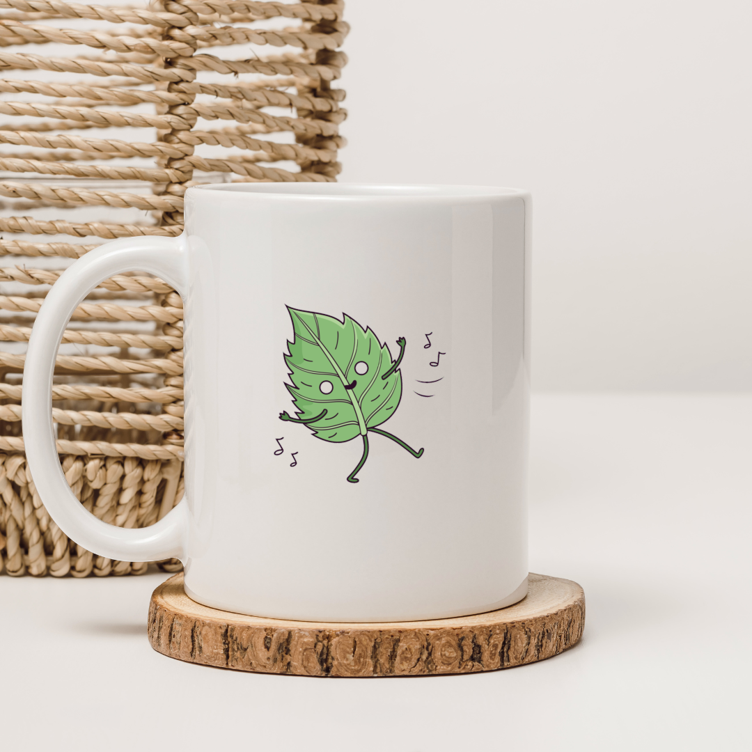 Mug orné d'une feuille joyeuse dansante pour un style estival éclatant
