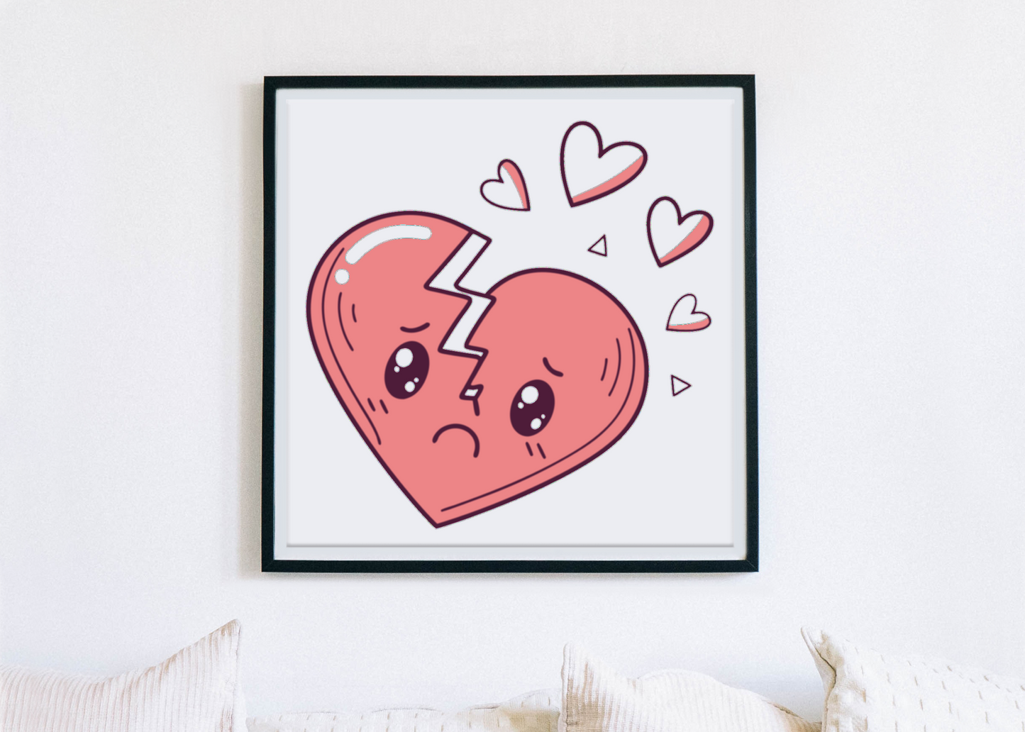 Cadre décoratif avec illustration kawaii cœur brisé.