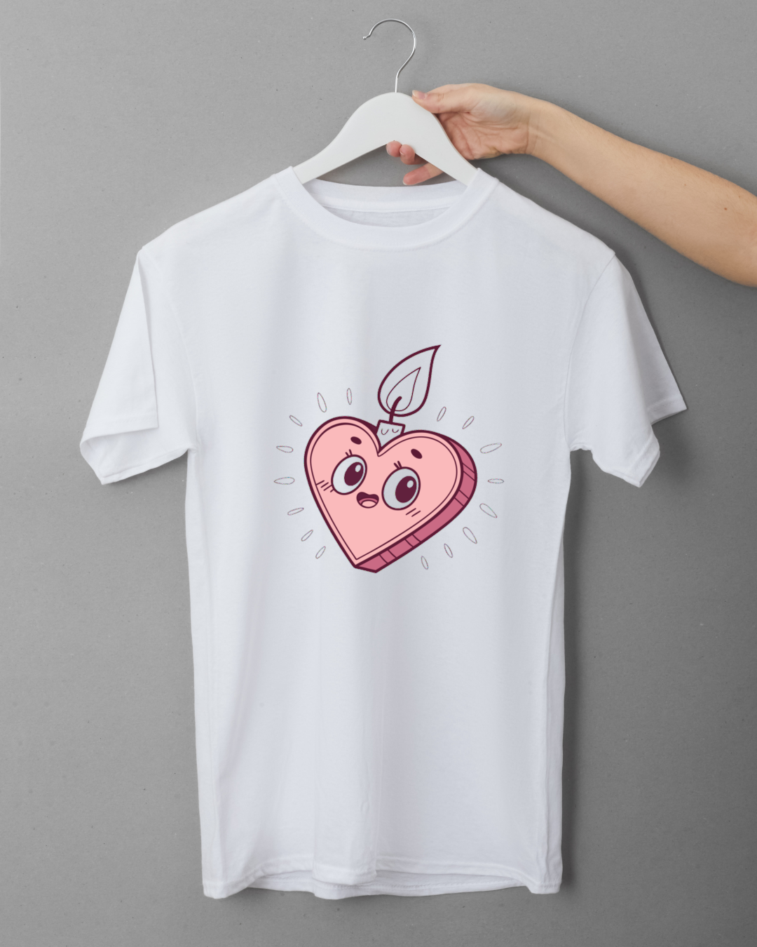 Illustration cœur bougie kawaii sur T-shirt, ajout mignon à votre garde-robe.