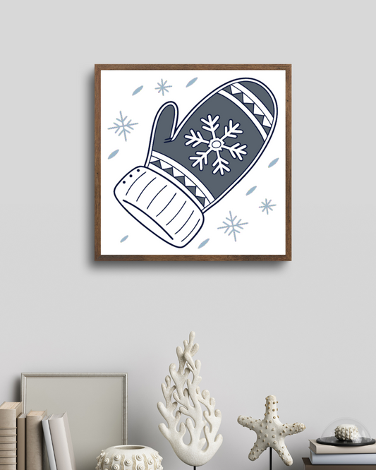 Cadre mettant en valeur une moufle blanche minimaliste sur fond hivernal