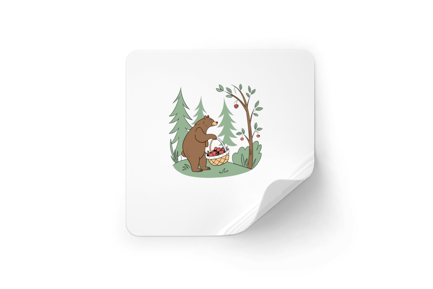 Sticker affichant un ours mignon récoltant des fruits dans une forêt magique