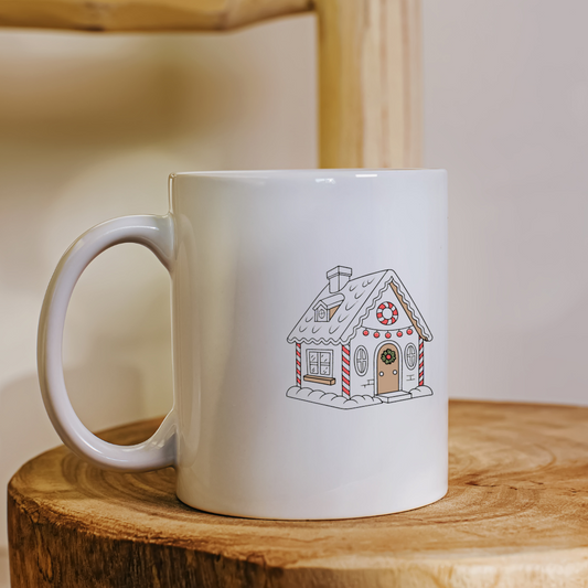 Mug festif décoré d'une maison de pain d'épices pour un Noël magique