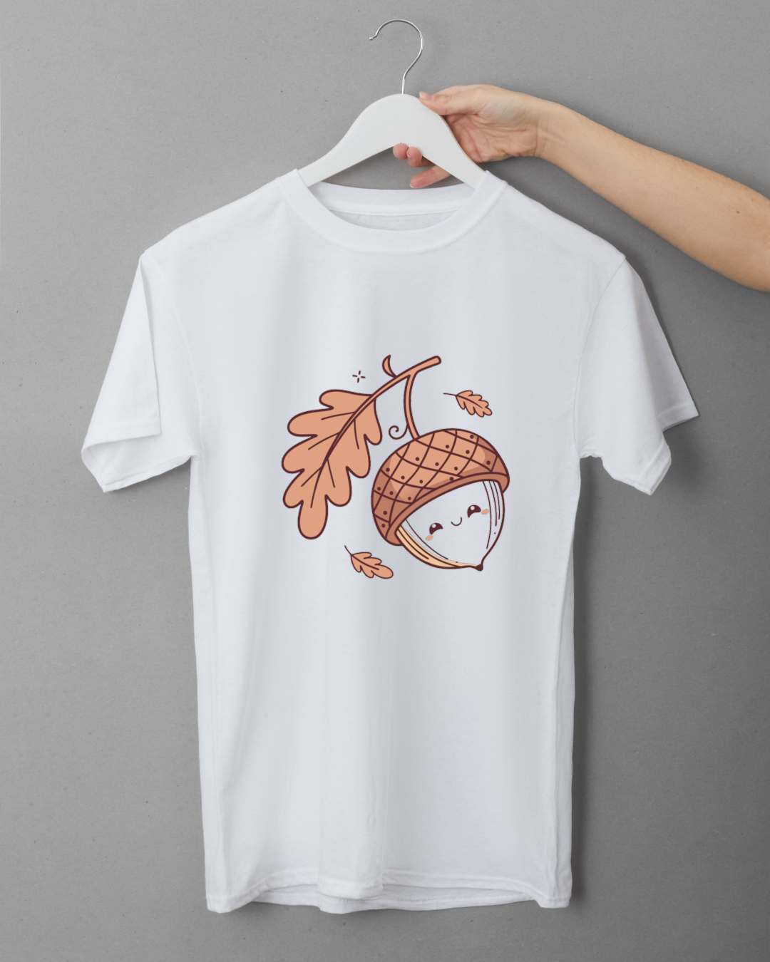 T-shirt avec motif doodle drôle représentant un gland rieur dans un style automnal