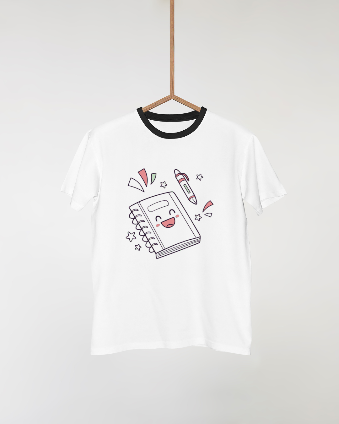 T-shirt avec dessin kawaii carnet et stylo joyeux pour école créative