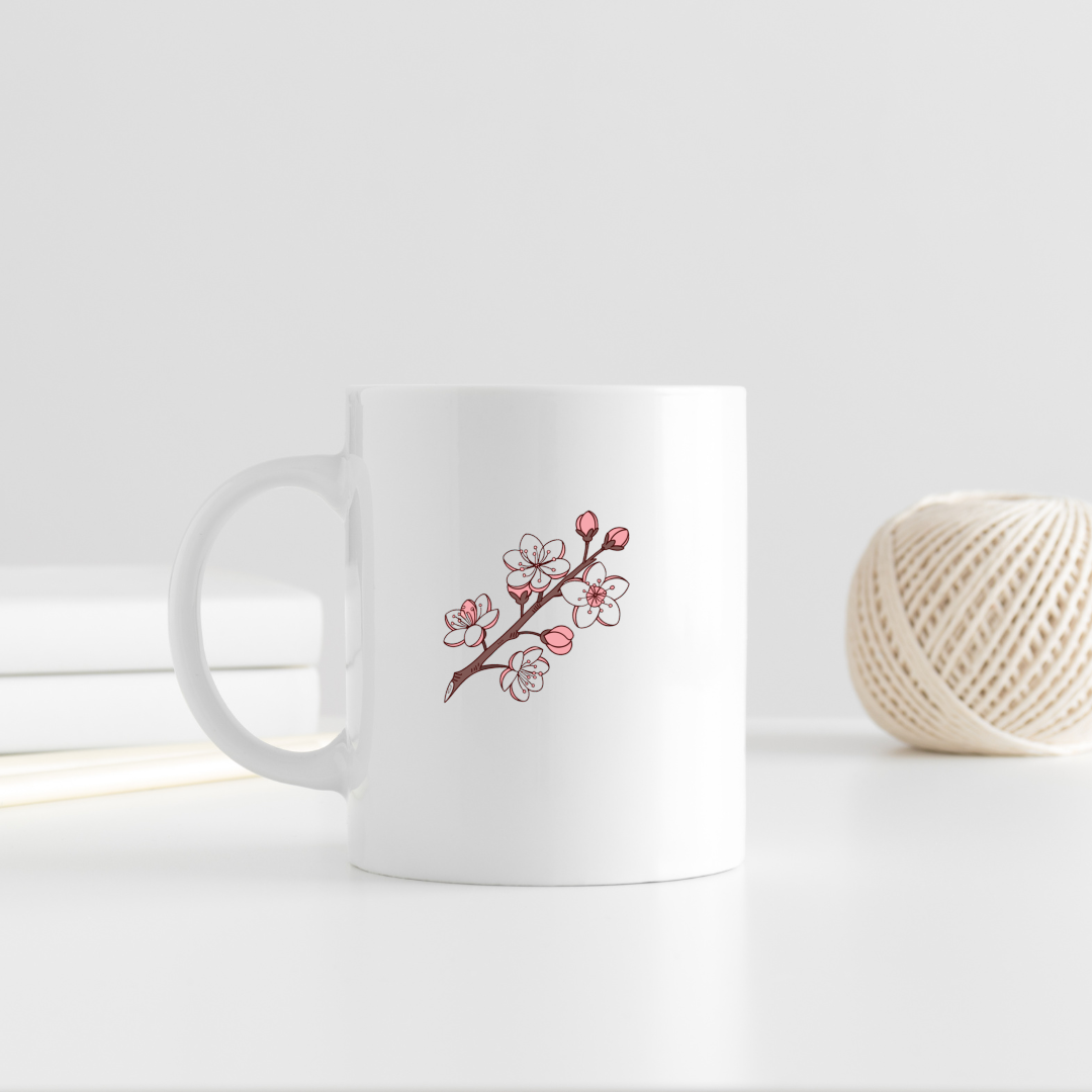 Mug décoré de fleurs de cerisier pastel, ambiance printanière et élégante