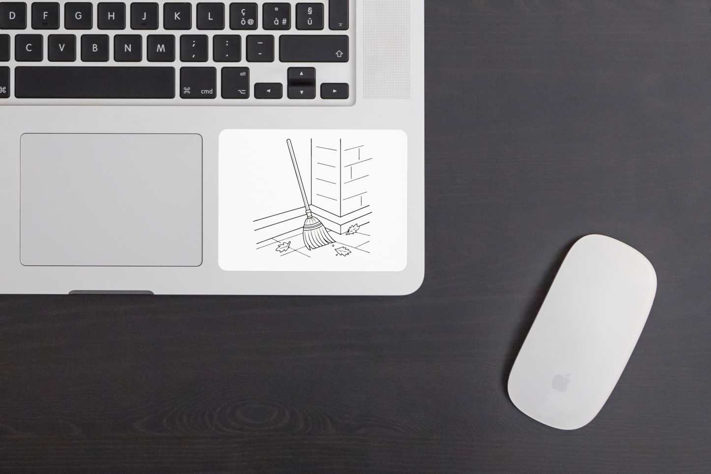 Sticker automnal épuré avec balai nettoyant feuilles sur fond minimaliste