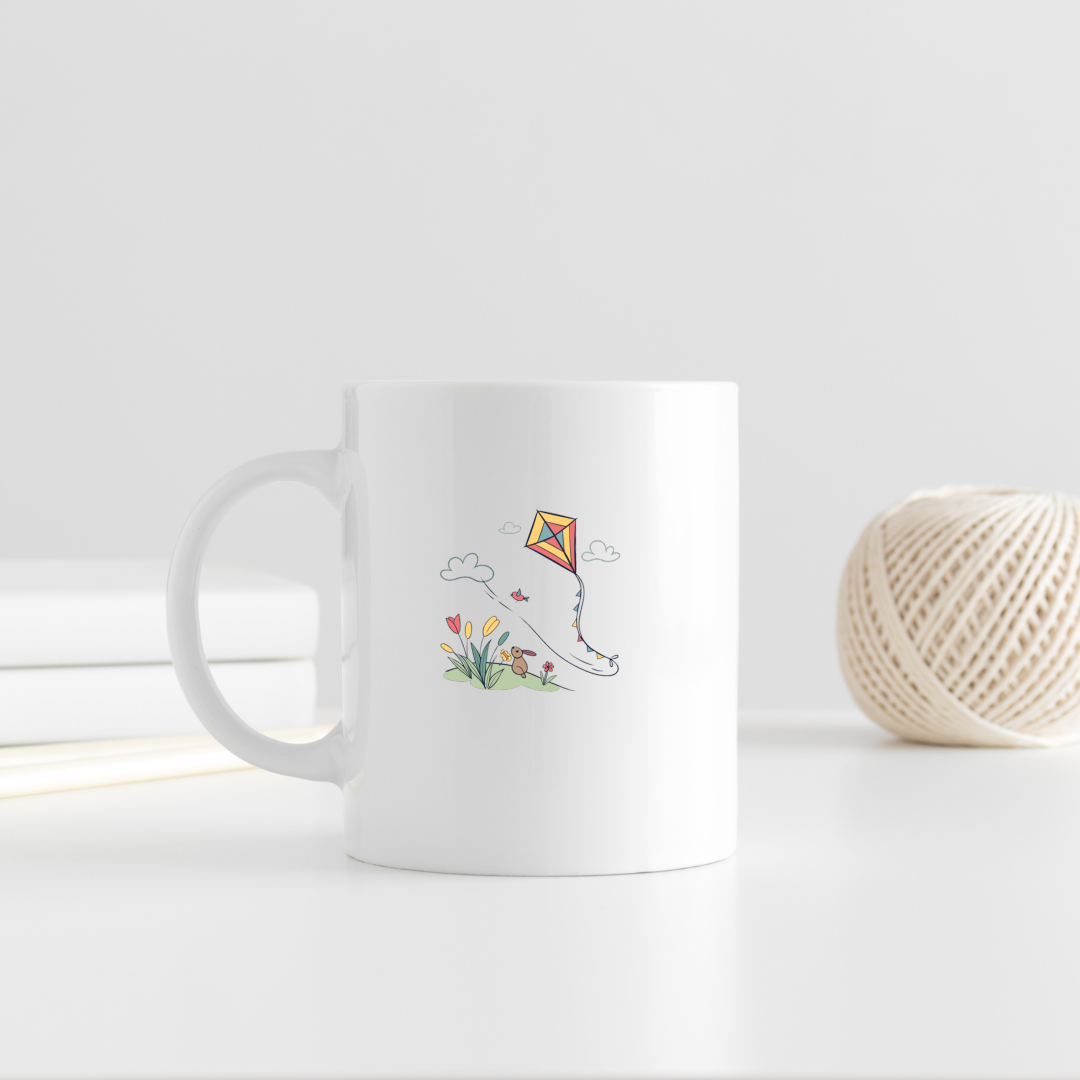 Mug avec dessin coloré d'un cerf-volant en vol dans un style printanier