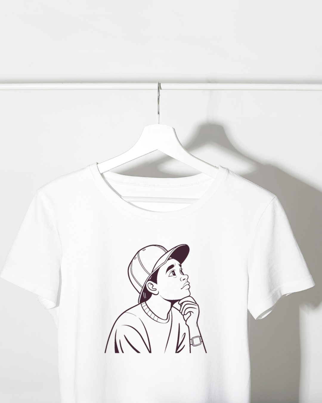 T-shirt créatif avec icône monochrome représentant un jeune rêveur pensif