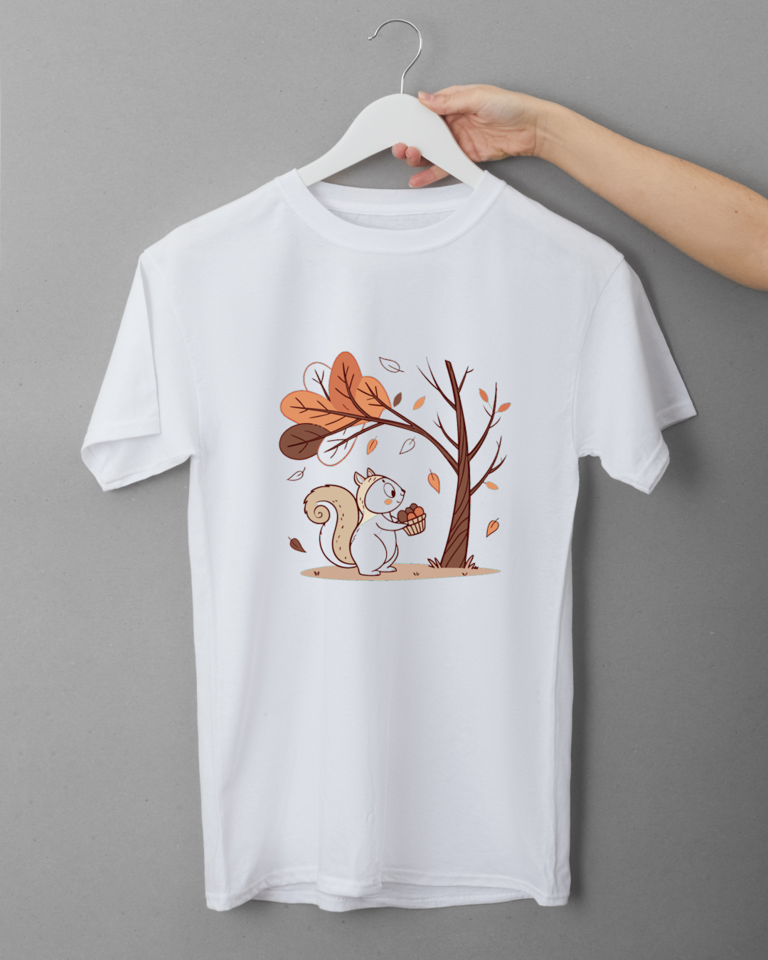 T-shirt automnal avec écureuil pastel récoltant des noisettes