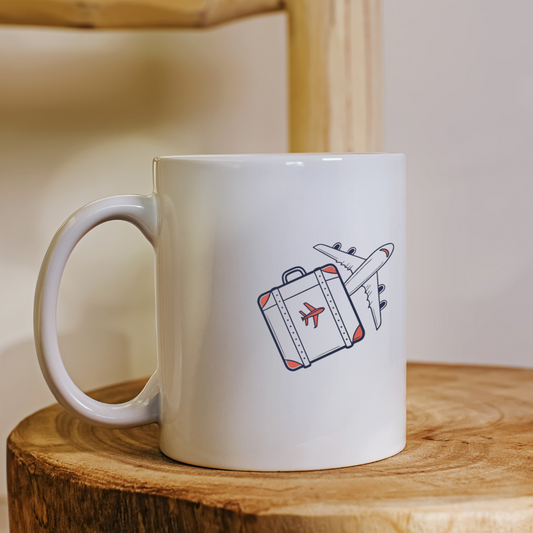 Mug décoré d'une valise volante minimaliste évoquant le voyage