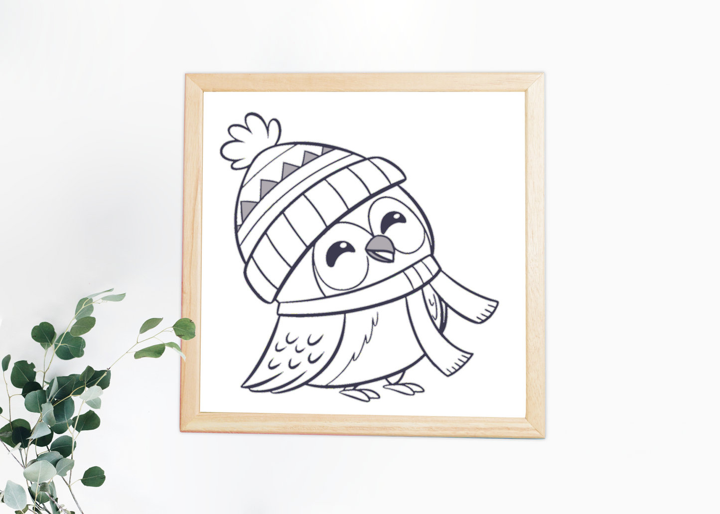 Cadre contenant une chouette cartoon joyeuse dans un thème hivernal enchanteur
