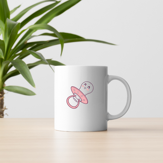 Illustration de tétine kawaii sur une tasse, ajoutant une touche mignonne et vintage.