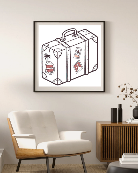 Cadre déco avec icône valise pastel évoquant l'évasion et l'exploration