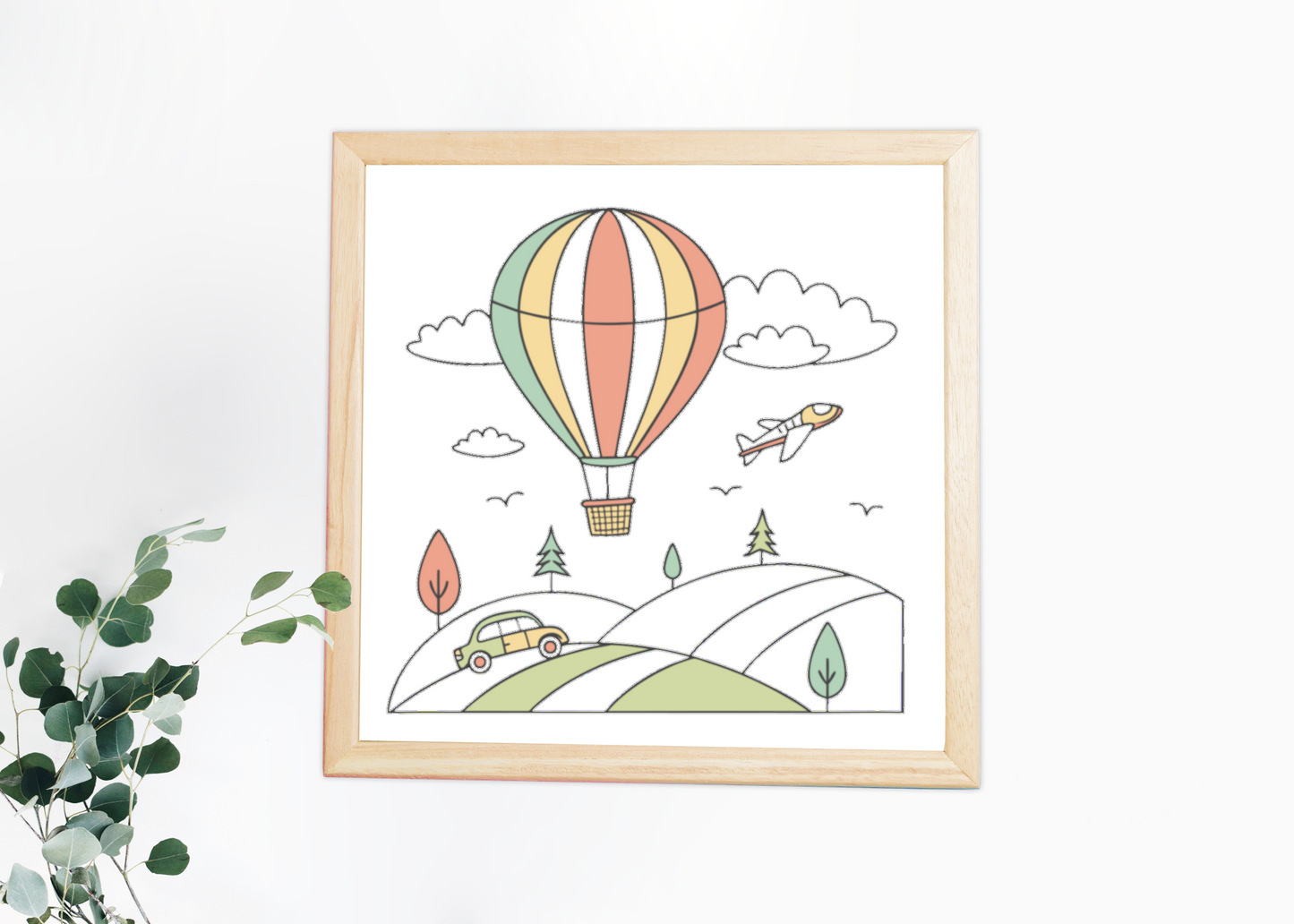 Cadre décoratif avec montgolfière sur fond pastel pour une ambiance aérienne détendue