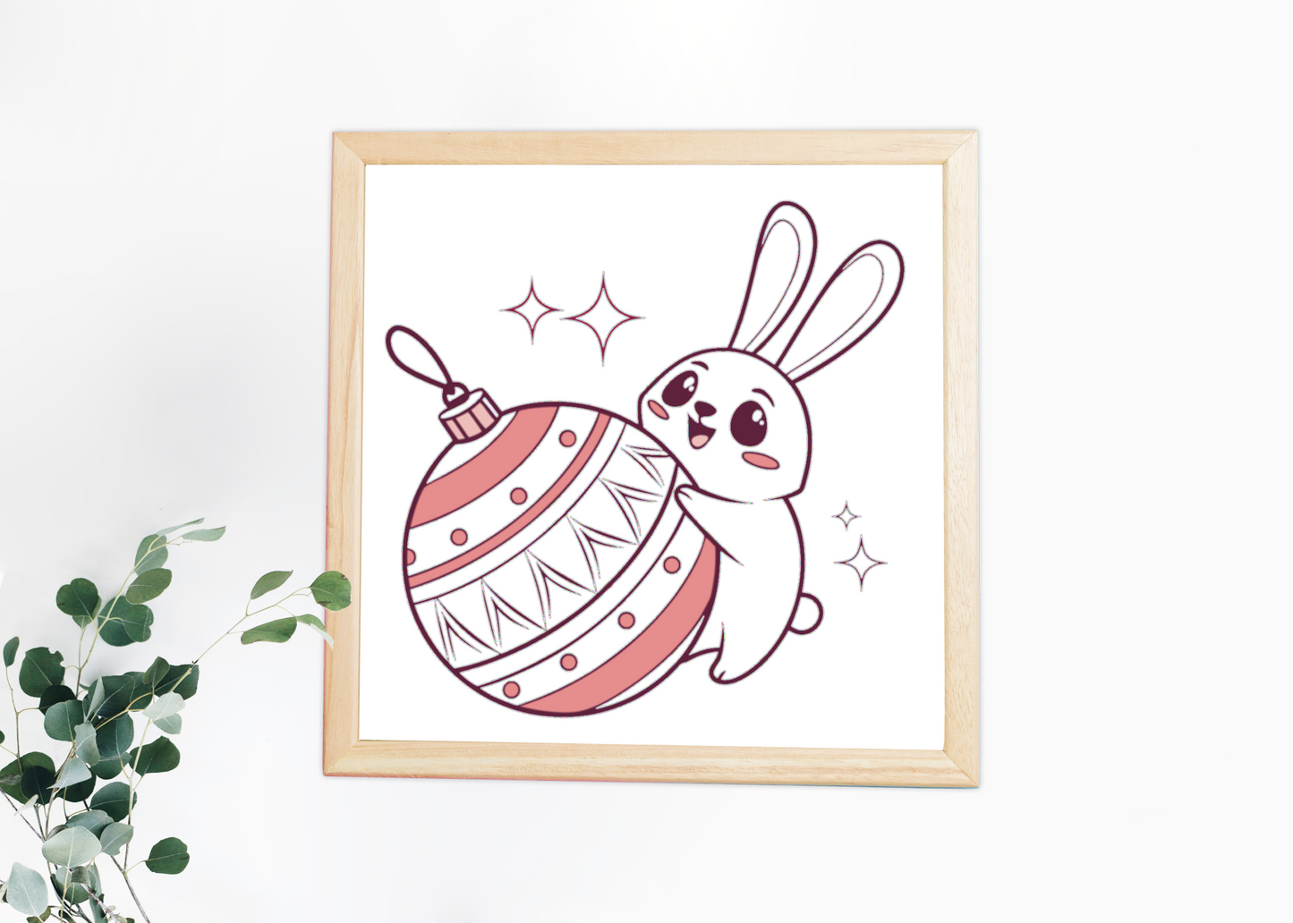 Cadre élégant avec lapin joyeux et boule de Noël, parfait pour les fêtes hivernales