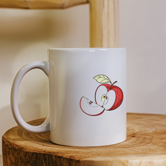 Mug décoré d'une pomme tranchée au style minimaliste pour une cuisine créative