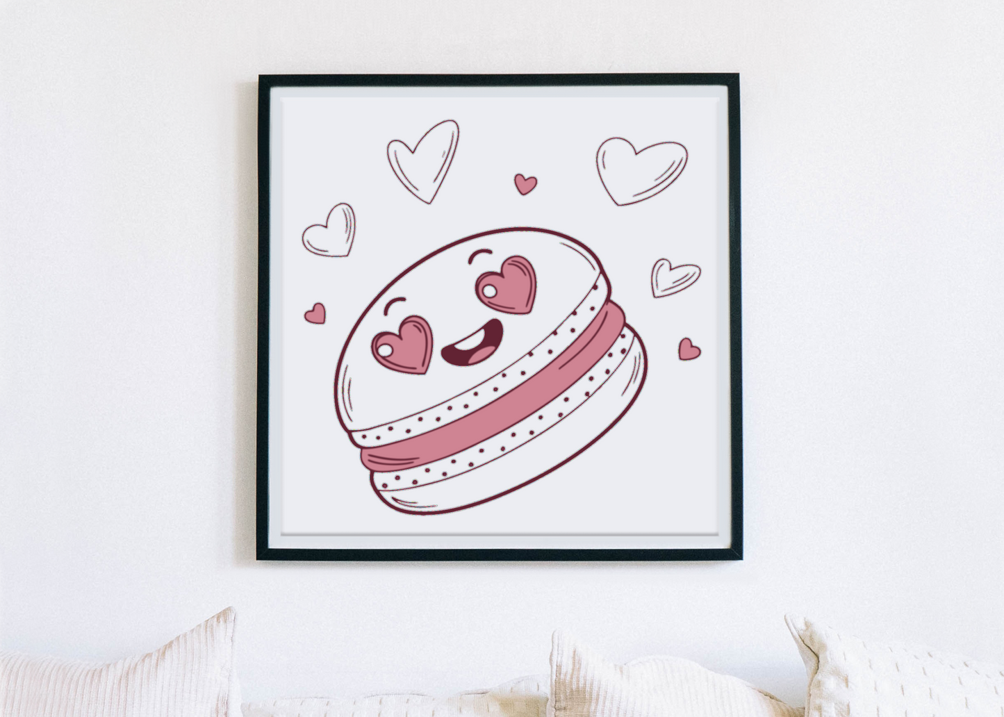 Cadre décoratif illustré d'un macaron kawaii avec un style doodle amical