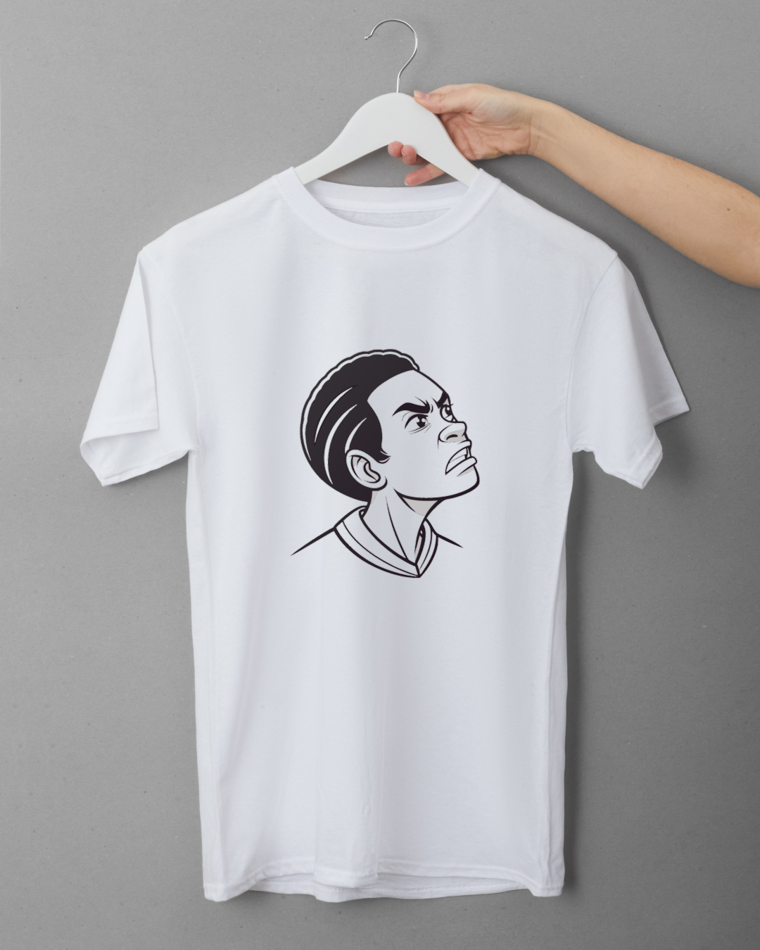 T-shirt avec une illustration dynamique d'un visage déterminé et expressif