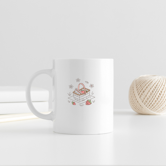 Mug au design estival avec panier pique-nique souriant sur fond pastel