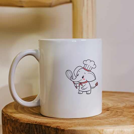 Mug avec dessin d'un éléphant chef joyeux, idéal pour une cuisine ludique