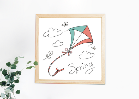 Cadre mural avec cerf-volant minimaliste flottant évoquant joie et liberté