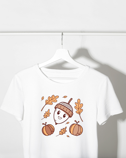 T-shirt illustré au doux motif pastel de gland souriant dans une ambiance automnale