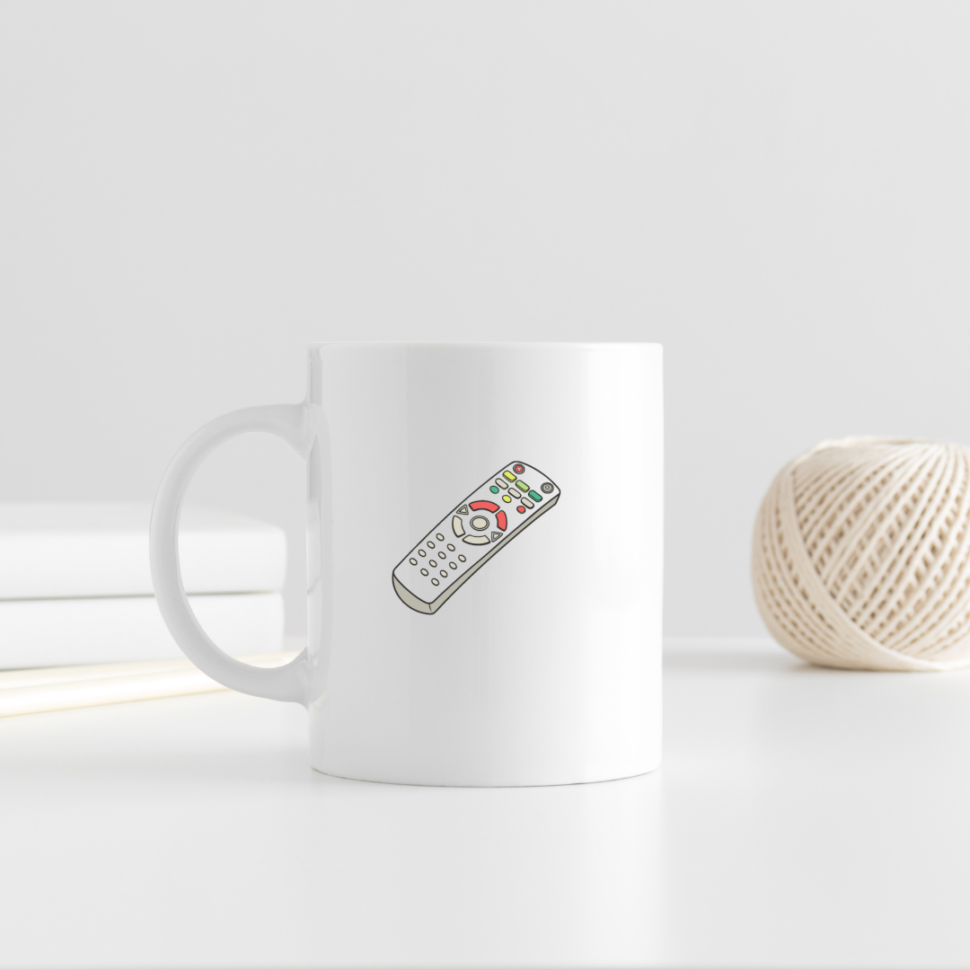 Mug avec icône télécommande relax dessinée, idéal pour un quotidien zen